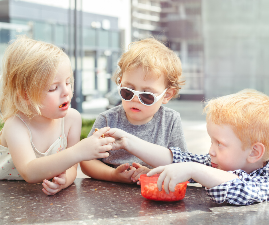 children sharing and learning how to cooperate and take turns