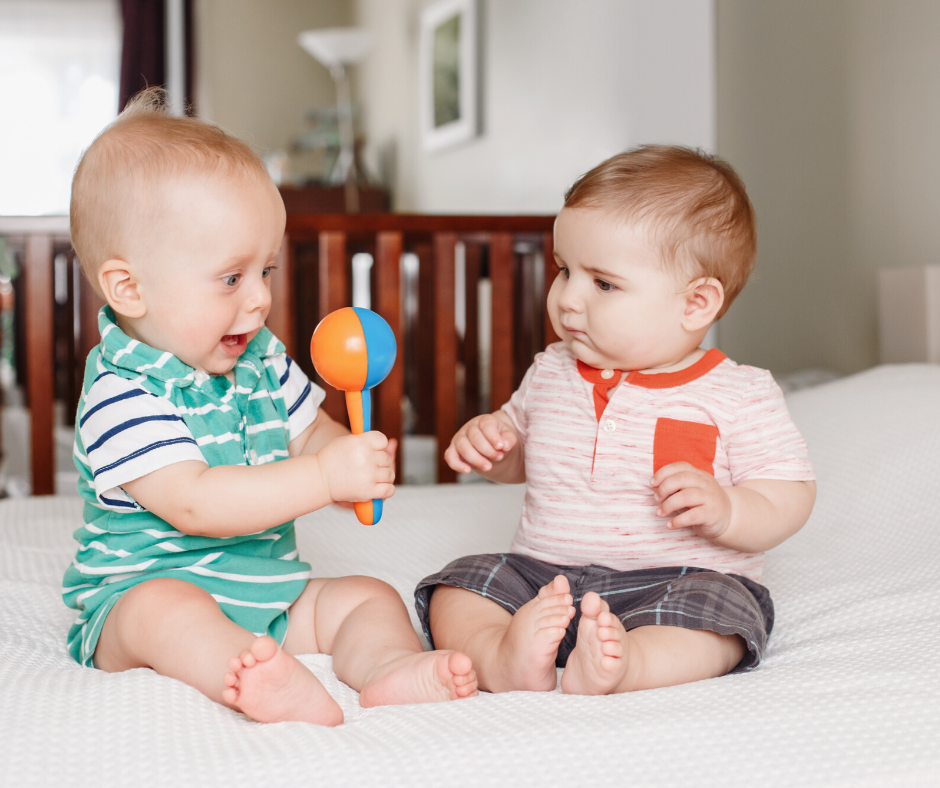 even babies can learn how to cooperate and take turns